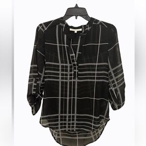 Blouse with black cami underneath sheer blouse